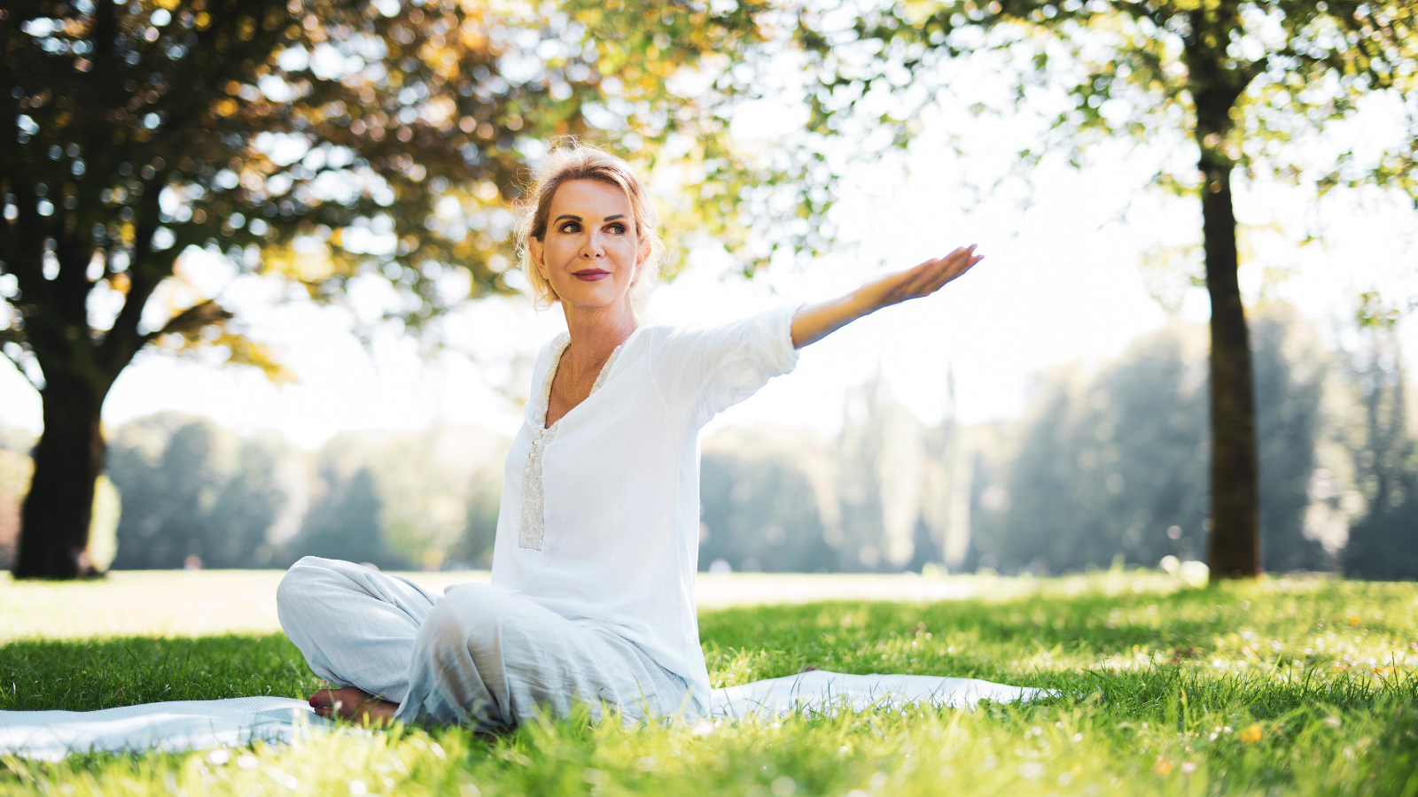 Yoga student practicing yoga to help manage chronic pain