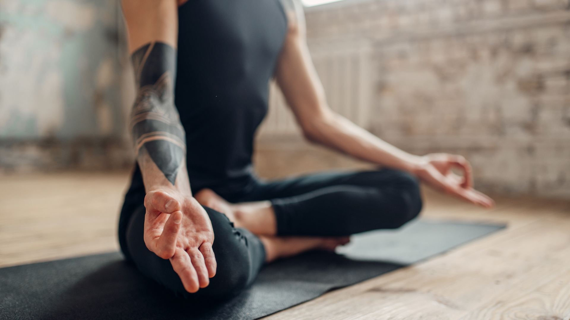 Man seated in meditation.