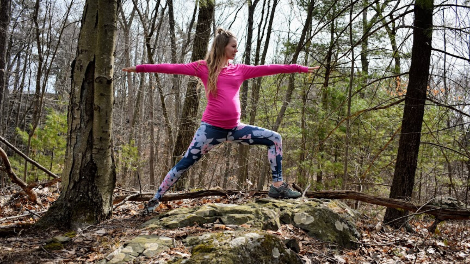 pregnant yoga student practicing warrior II pose