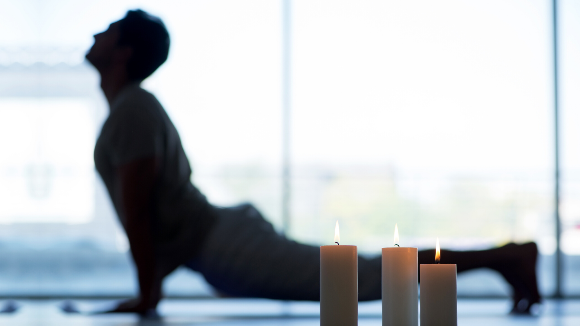 Male yoga student practicing upward facing dog urdhva mukha svanasana