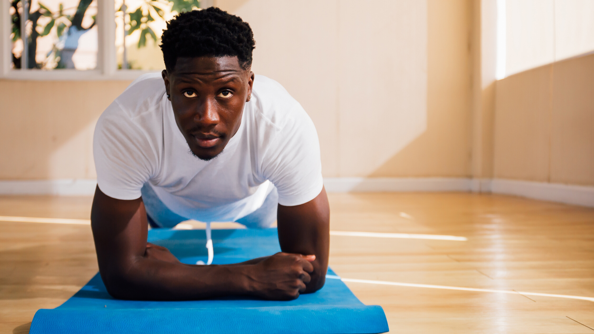 yoga_student_enjoying_the_benefits_of_plank_pose