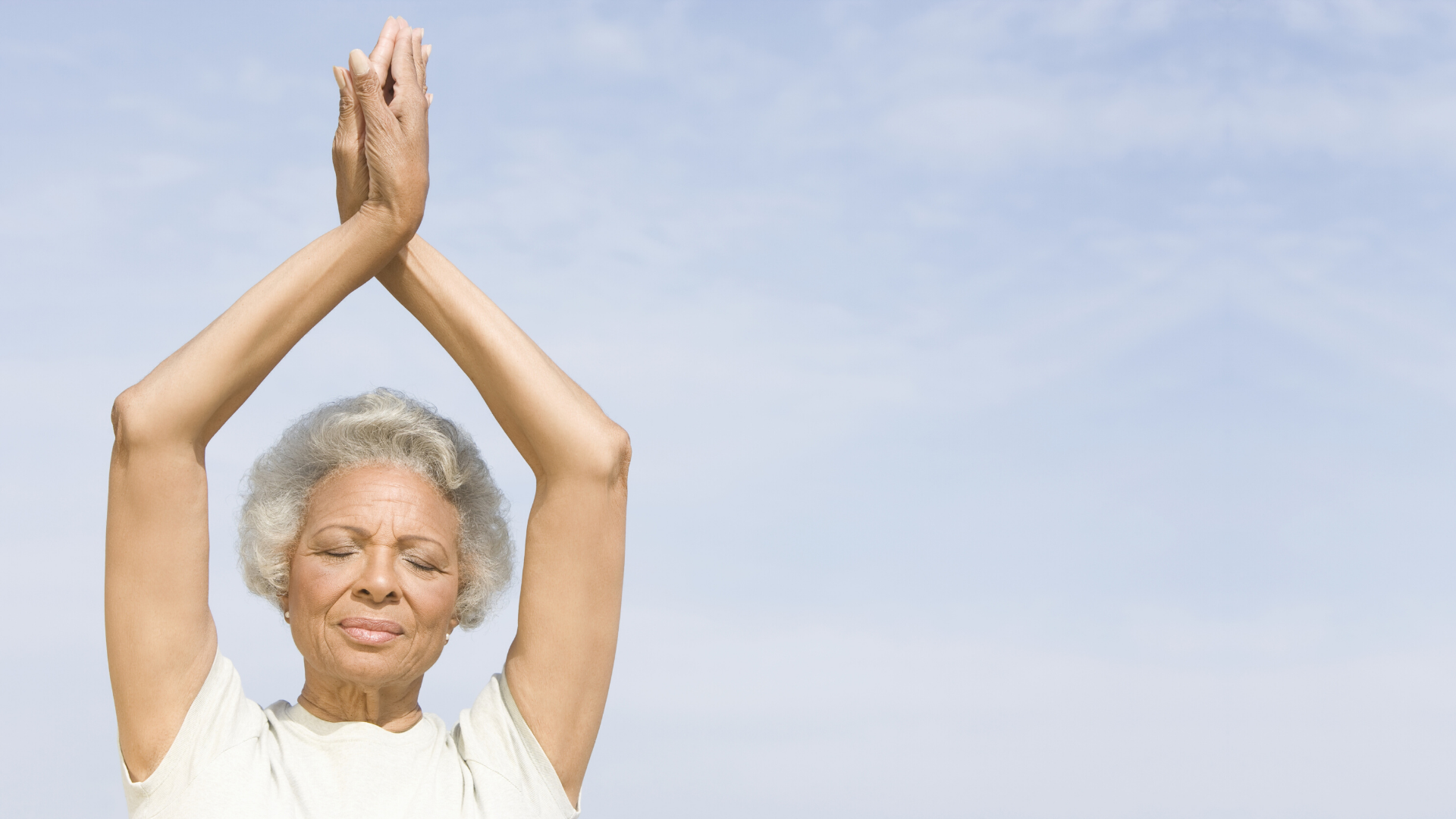 older_yoga_student_practicing_yoga_and_meditation