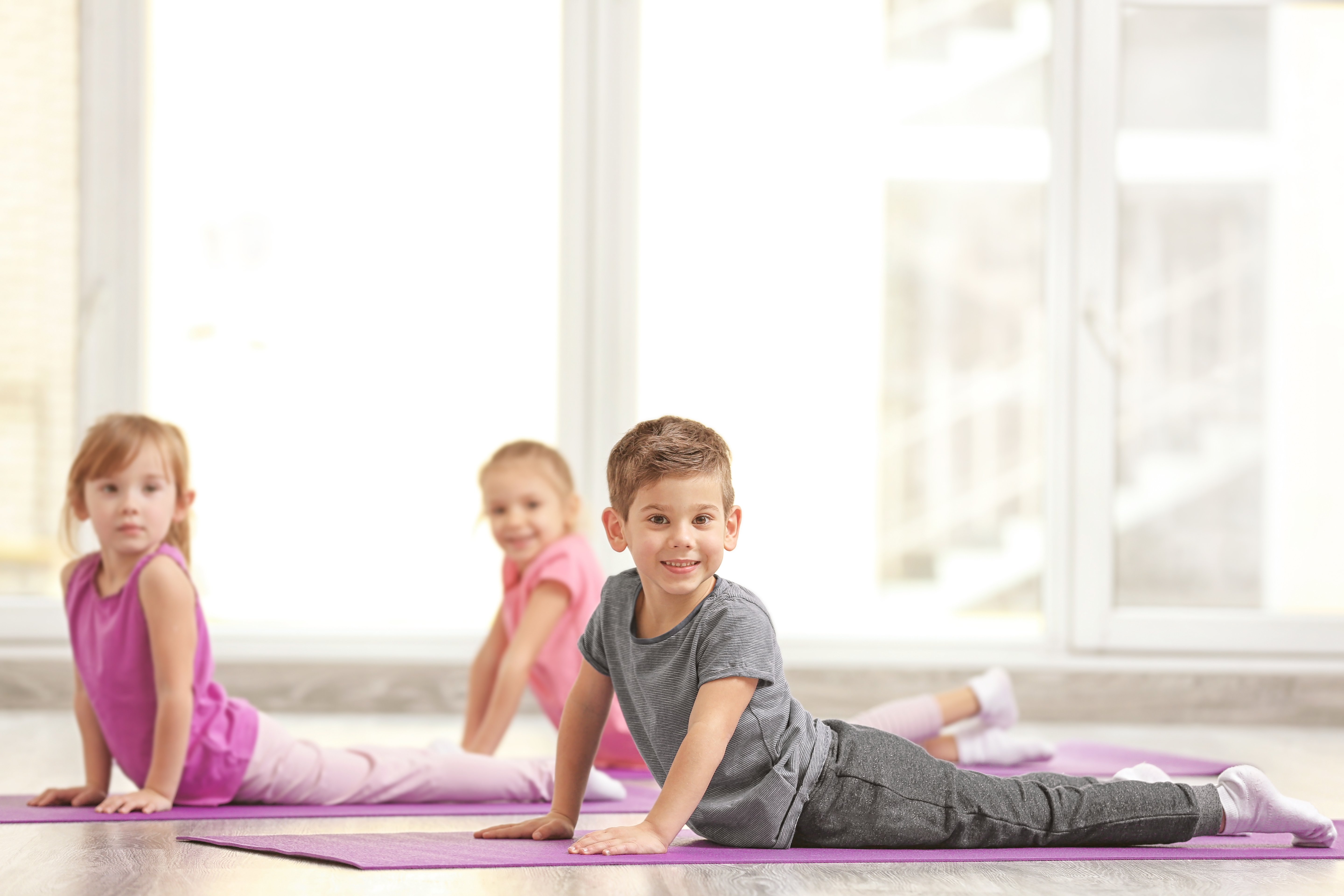 kids practicing yoga, cobra pose