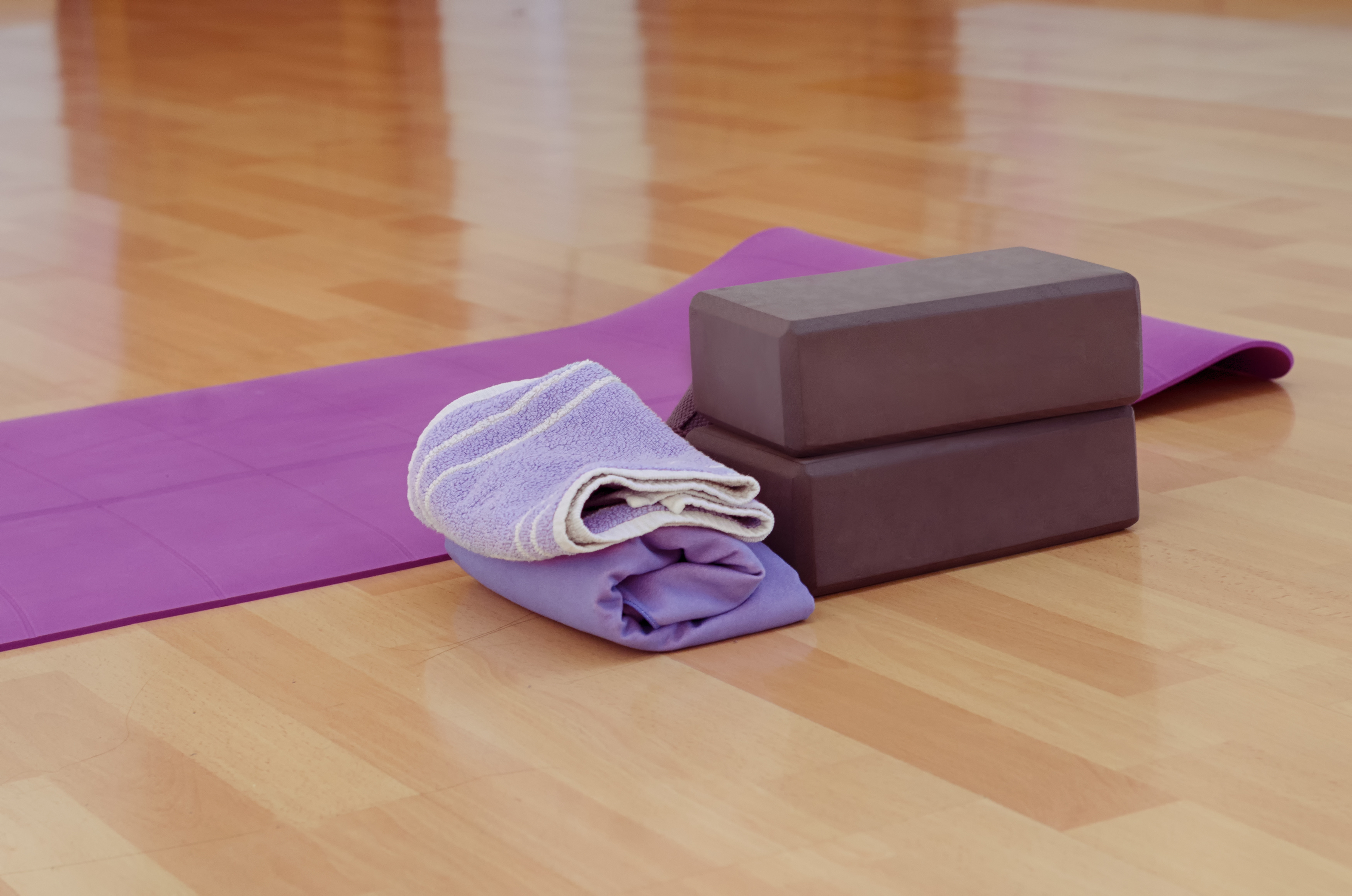 Yoga block and towel, props for yoga therapy, yoga for posture improvement, yoga to break away from your computer,