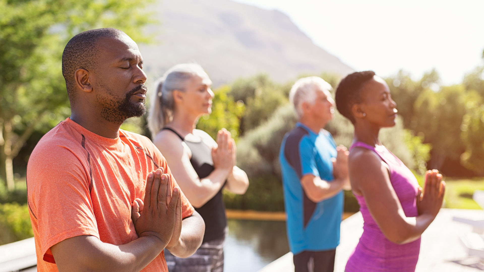 group_of_yoga_student_practicing_yoga_outside