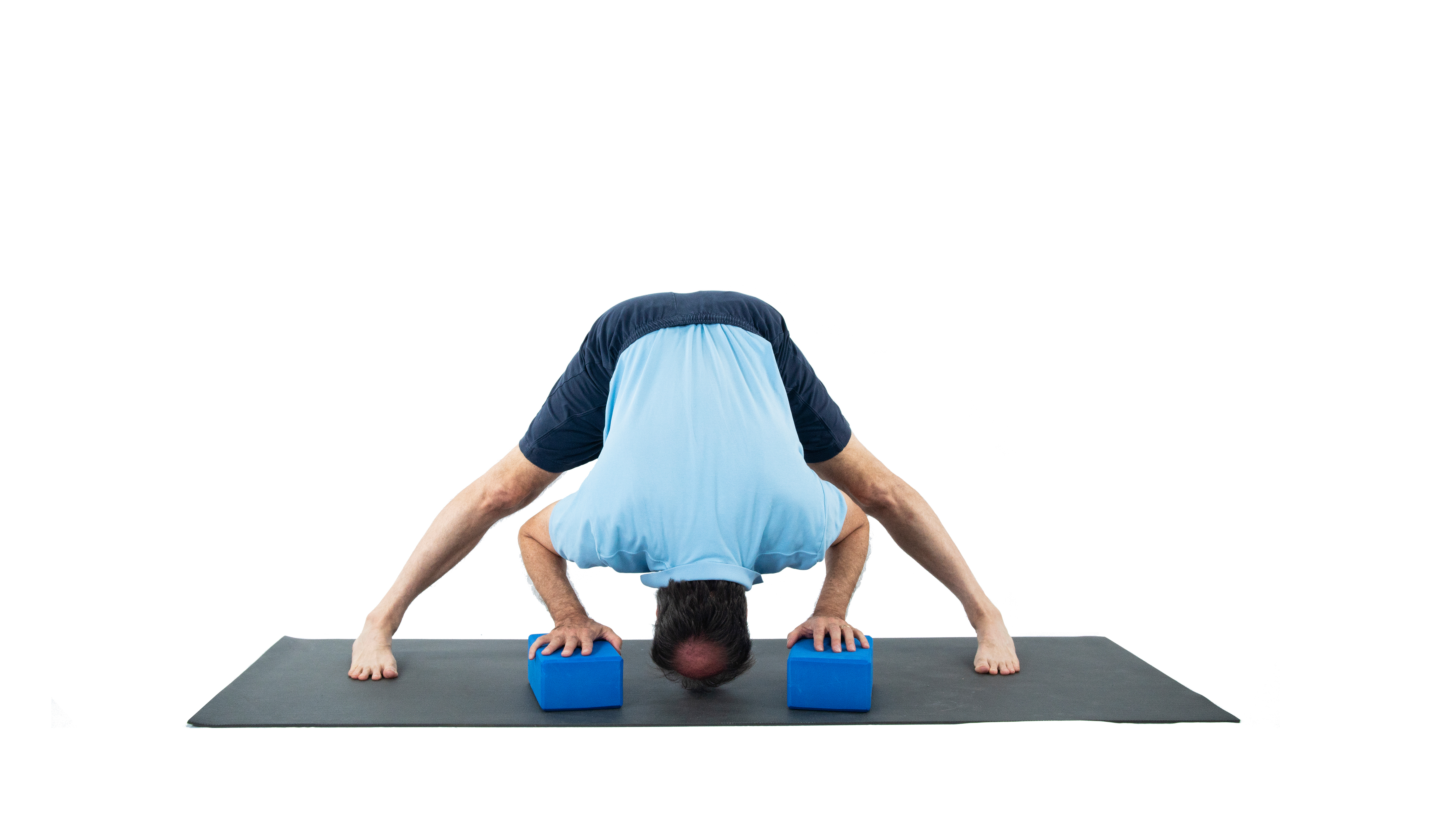 Prasarita Padottanasana, wide-legged standing forward bend pose, calming pose, stress relief pose