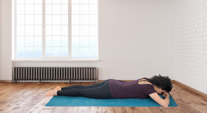 woman practicing yoga corocodile pose