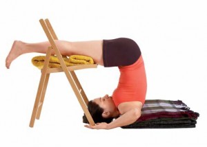 Supported Halasana, supported shoulder stand, Yoga with props,